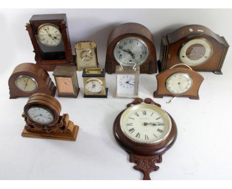 A collection of mantel clocks, carriage clocks, anniversary clocks and barometers, to include manual wind &amp; quartz exampl