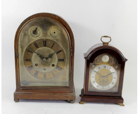 An ebony cased Elliott bracket clock, manual wind 8 day movement, retailed by Arthur Saunders of London, 24cm tall, together 