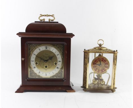 A mahogany cased bracket mantel clock by Stewart, having an 8 day German movement striking to gong, 33cm tall, together with 