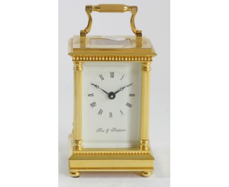 Fox &amp; Simpson, a gilt brass Anglais Riche cased carriage time piece, the white enamel dial with Roman numerals, the movem
