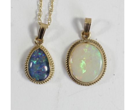 A 9ct gold and opal pendant, 12 x 10mm and a 9ct gold black opal doublet pendant, chain, 2.7gm 