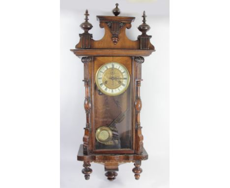 Friedrich Mauthe, Schwenningen, Germany, a late 19th century Vienna style walnut wall clock, brass dial, ivorine chapter ring