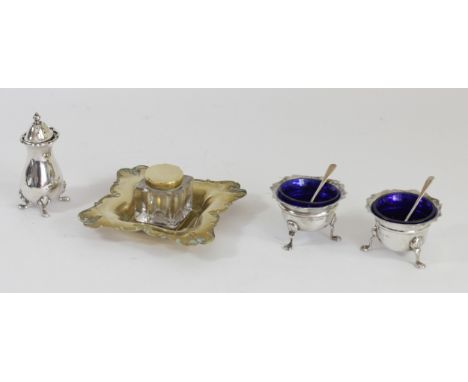 A silver pair of salt pots, Birmingham 1908, with matching silver spoons and blue glass liners, an electroplated pepper pot a