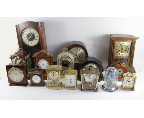 A collection of mantel clocks, carriage clocks, anniversary clocks, wall clocks and barometers, having manual wind and later 