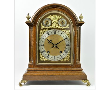 Winterhalder &amp; Hofmeier, an Edwardian oak mantle clock, the gilt arched dial with silvered chapter ring, subsidiary chime