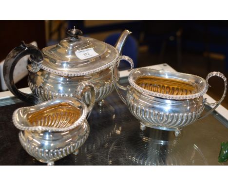 3 PIECE STERLING SILVER TEA SERVICE COMPRISING TEAPOT, SUGAR &amp; CREAM, WITH LONDON ASSAY MARKS, MAKER MARKS FOR WALTER &am