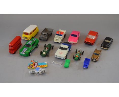 Quantity of assorted unboxed vintage plastic models including Japanese and Hong Kong examples