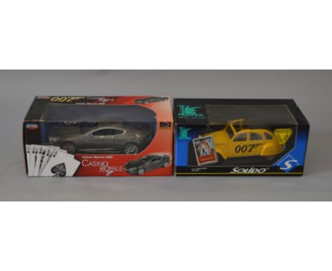 Two large scale James Bond diecast model cars: JoyRide Casino Royale Aston Martin DBS; Solido 8051 2 CV James Bond. Both E an