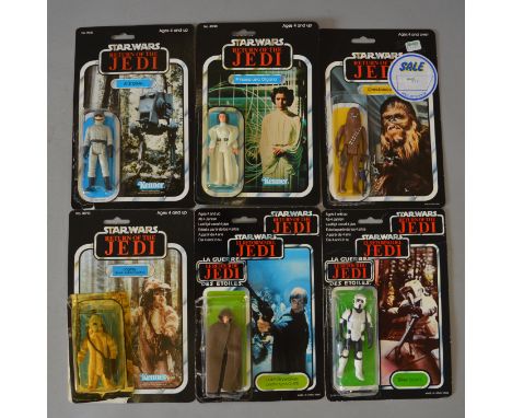 Six Star Wars figures on opened ROTJ cards: Palitoy Chewbacca on 65 back; Biker Scout on trilogo 70 back; Kenner Princess Lei