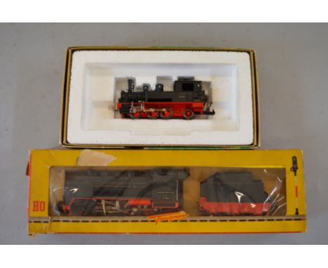 H0 scale. Fleischmann 2-6-0 tender locomotive, together with Trix 0-6-2 locomotive. Both G boxed. End flap missing to one box