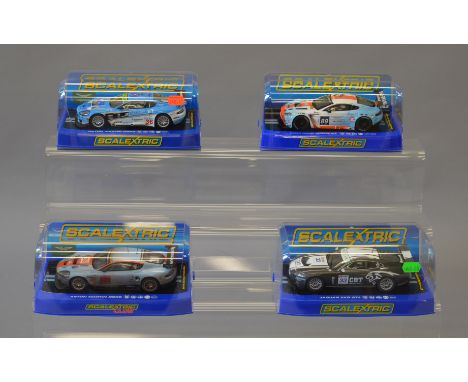 4 Scalextric Aston Martin and Jaguar cars: C2978; C3014; C3662; C2965, all cased