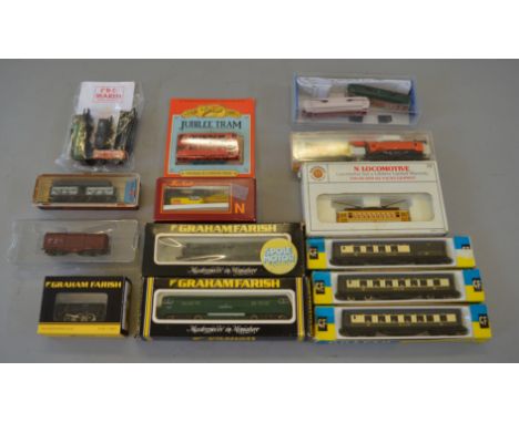 N Gauge. Mixed lot. Includes repainted class 52 "Western", BR J94 (Damaged running gear), BR 0-6-0 goods engine, assorted rol