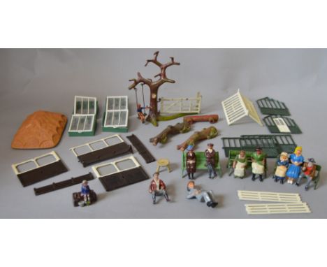 Quantity of hollowcast figures, includes: Britains Tree and Gate, with child on swing; two Britains tree trunks; Britains Gar