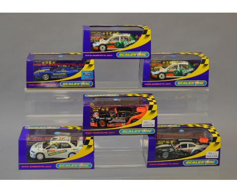 6 Scalextric Cars: 2 x C2645; C2816; C2682; C2711; C2785, all cased.