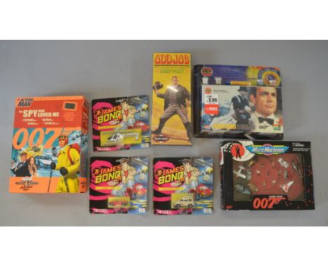 Quantity of James Bond toys: Hasbro Action Man The Spy Who Loved Me figure; Galoob Micro Machines 007 set; Airfix 04402 James