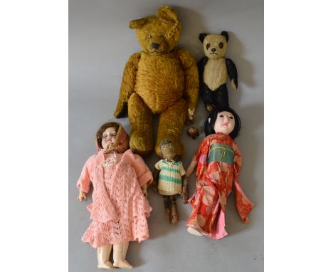 Mixed lot of vintage soft toys and dolls including a 1920s bear and an Amand Marseilles bisque head doll with sleeping eyes m