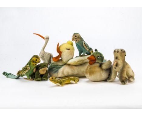 Eight post-war Steiff birds and aquatic animals, a Floppy Duck—9½in. (24cm.) long, a Robby Seal, two Hansi Budgerigar, a duck