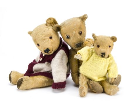 Two Chiltern-type teddy bears, with golden mohair, orange and black glass eyes, swivel head and jointed limbs —20in. (51cm.) 