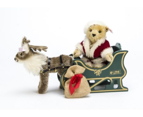 A Steiff limited edition Father Christmas Teddy Bear with Reindeer, 1288 of 2500, in original window box with certificate, 20