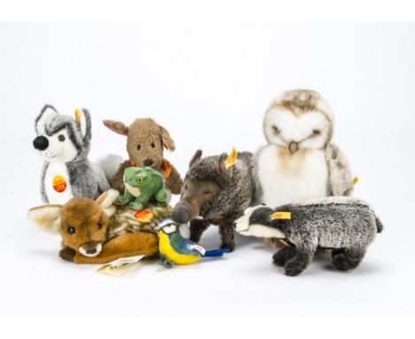 Eight modern Steiff yellow tagged animals, including Raggi wild boar, Lorli  sleeping fawn, Dachs badger, Scotty Husky and ot