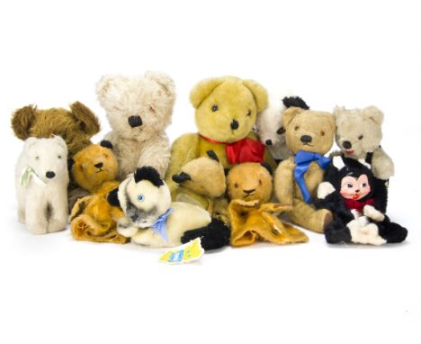 A quantity of teddy bears, A 1930s British wool plush poplar bear on all fours —10in. (25cm.) long, a brown mohair Knickerboc