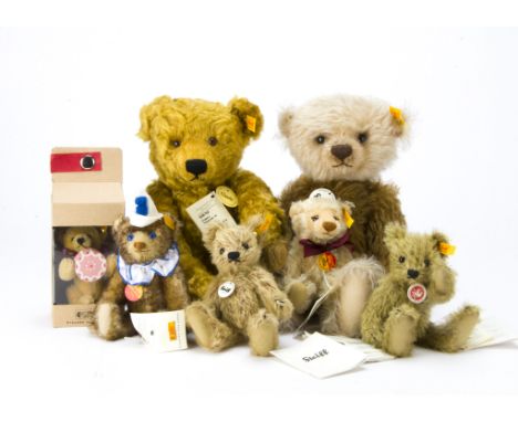 Seven Steiff yellow tagged teddy bears, Latte Macciato bear, Classic Teddy Bear 35, Teddy Clown 16 and four others, one with 