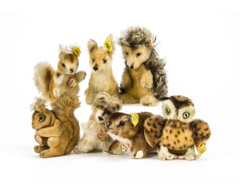 Seven post-war Steiff woodland animals, a Murmy Marmot —5¼in. (13.5cm.) long, a Possy Squirrel, a Raccy Racoon, a Joggi Hedge