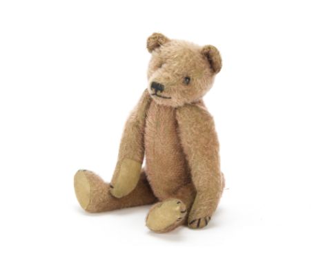 An early FADAP purple mohair teddy bear 1930-1932, With black boot button eyes, pronounced muzzle, black stitched nose, mouth
