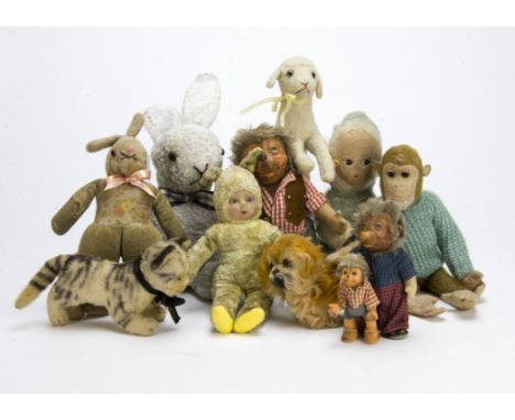 A Chad Valley baby bunting rabbit doll 1930s, with green artificial silk plush, brushed cotton face with inset blue eyes and 