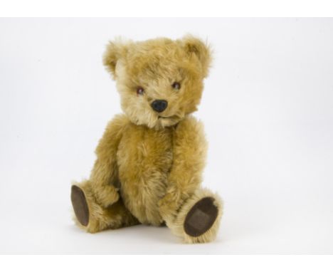 An interesting post-war Chad Valley teddy bear, Almost identical to a Chiltern Hugmee with golden mohair, orange and black pl