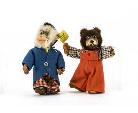 A post-war Steiff Teddyli,  Teddy Baby brown mohair head, rubber body, checked shirt and orange felt dungarees —4¼in. (11cm.)