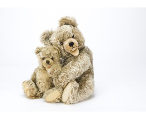 Two German Zotty Bears, A large Hermann Zotty bear with frosted brown mohair and glass eyes —20in. (51cm.) high (very good); 