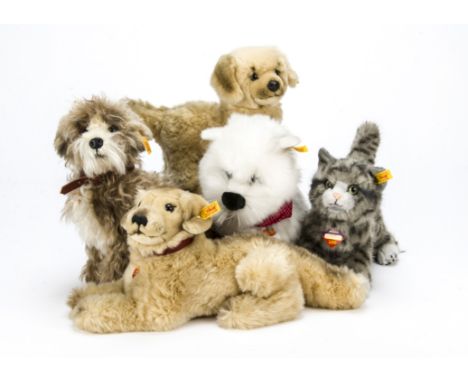 Five Steiff modern yellow tagged dogs, Treff —11¾in. (30cm.) high, Caesar Tommi and Hektor, lying and standing; and Whiskas k