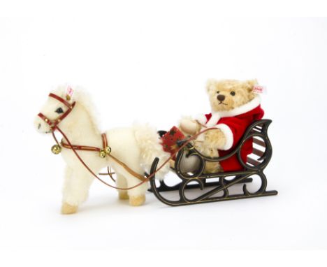 A Steiff limited edition Father Christmas Teddy Bear with Pony Sledge, 1560 of 4000, in original window box with certificate,