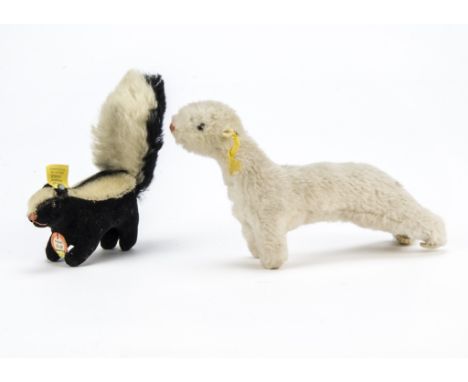 A post-war Steiff Skunk, With button, yellow cloth and chest tag —4½in. (11.5cm.) long (button slightly corroded); and a Wigg