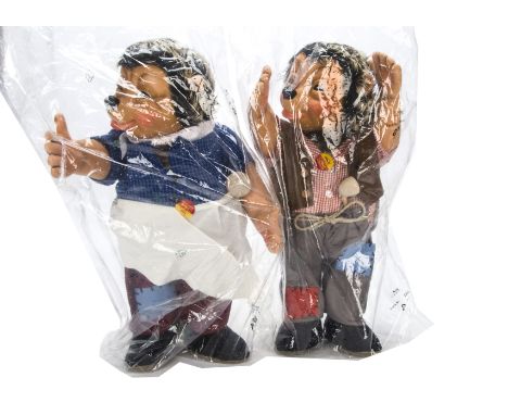 Two large modern Steiff Mecki and Micki, With plastic heads, wrapped in their original cellophane —20½in. (52cm.) high