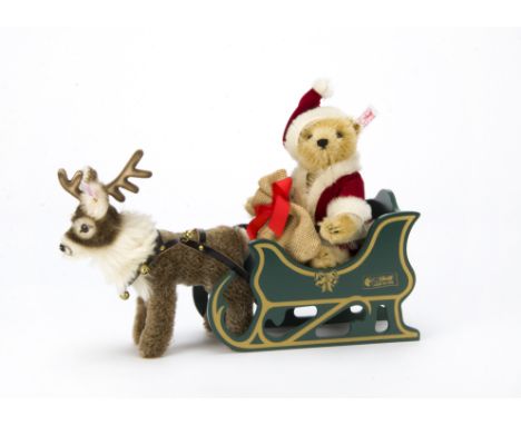 A Steiff limited edition Father Christmas Teddy Bear with Reindeer, 929 of 2500, in original window box with certificate, 200