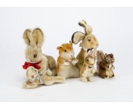 Post-war Steiff rabbits and other small mammals,  Four rabbits, two standing on hind legs —3¾in. (9.5cm.) height of smallest,