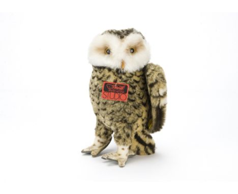 A Steiff Studio Screech Owl 1980s, With large red tag, button and yellow cloth tag —12in, (30cm.) high 