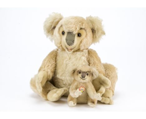 Two post-war Steiff koala bears, An unusual large example —13¾in. (35cm.) high; and a small example with chest tag (very slig