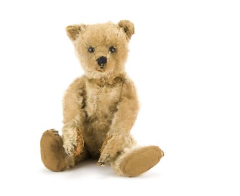 A rare and early Bing teddy bear circa 1908, With rare all-in-one ears and back of head, dark blonde mohair, black boot butto