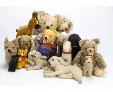 Various soft toy dogs and teddy bears, A post-war Chad Valley terrier with label; two British Pekinese, other dogs, a cat and