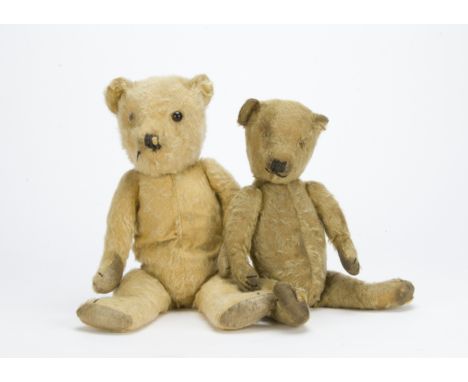 Two 1930s Chiltern type teddy bears, Both with golden mohair, one orange and black glass eye between the two, black stitched 