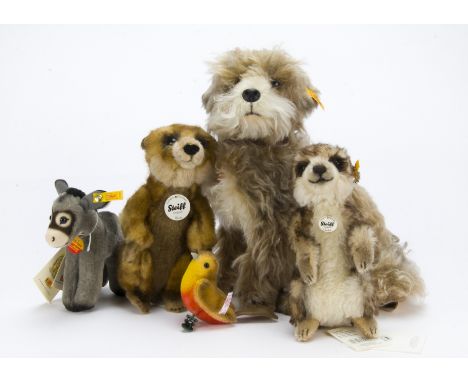 Four Steiff yellow tagged animals, Treff —11¾in. (30cm.) high, two Meerkats and a Donkey; and a limited edition Christmas Tre