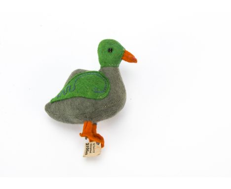 A Steiff felt duckling from Duck Chain, circa 1917, Dark grey and green felt, black bead eyes, stitched detail on wing, orang