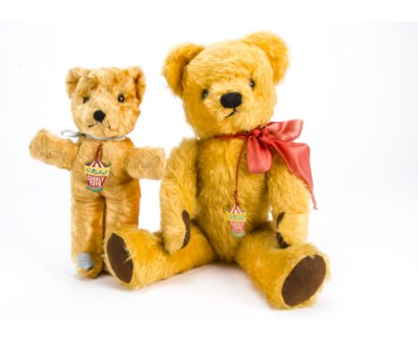 Two St Michael Cuddly Toy teddy bears,  Probably made by Chad Valley, the larger with golden mohair, orange and black glass e