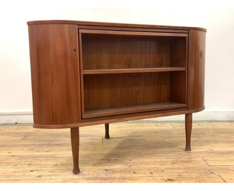 Sola Møbelfabrik, A Norwegian mid century teak corner bookcase and cocktail drinks cabinet, the revolving central section wit