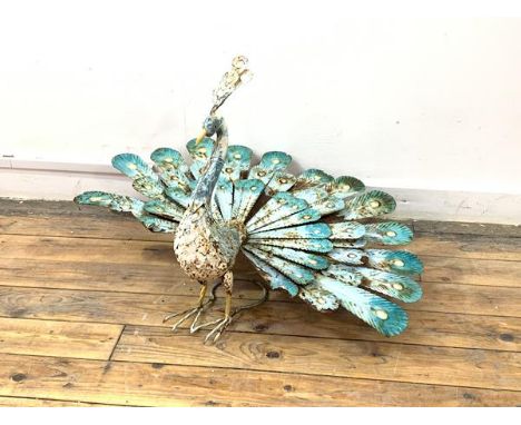 A painted metal model of a peacock, H54cm