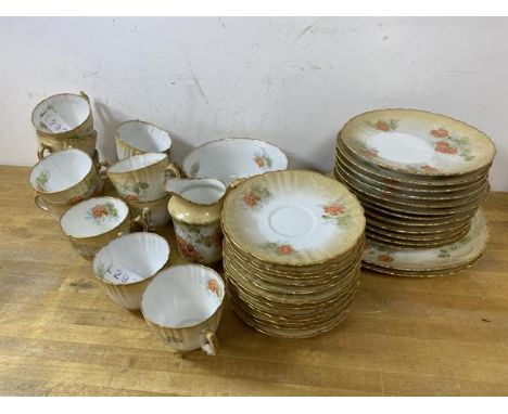 An AOPC teaset including twelve teacups, each measuring 6cm high, twelve saucers, twelve side plates, two cake plates, a milk