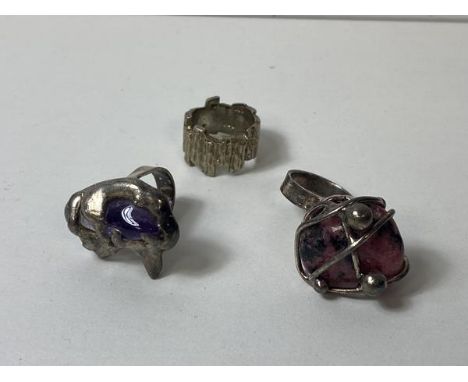 Two white metal rings, one with amethyst stone, both inscribed Wiggers Handmade in Denmark, size K and M, and another 1970's 